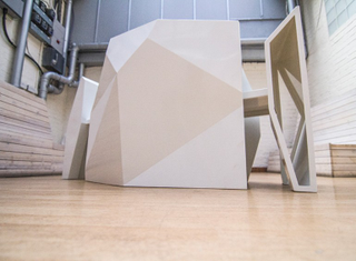 Illustration for article titled An Abstract Art Table and Chair Set That's Actually Useful and Not Awful